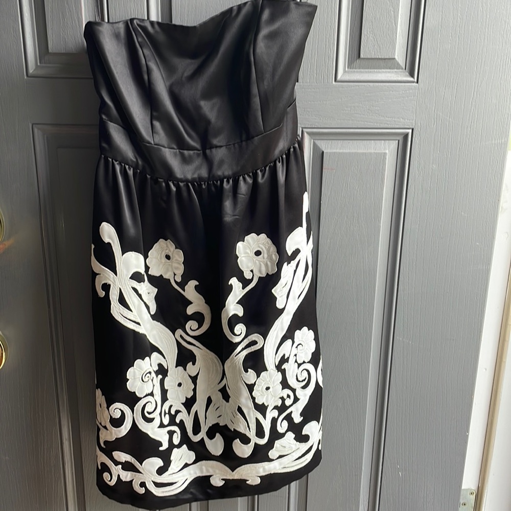 White House and Black Market black and white satin dress.   Straps included.